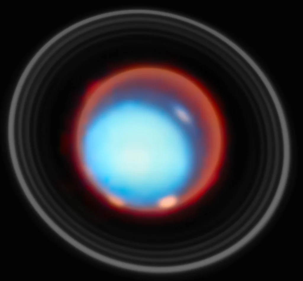 Urano observado por el telescopio James Webb en una imagen difundida por la ESA